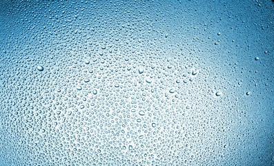 Water drops on blue background