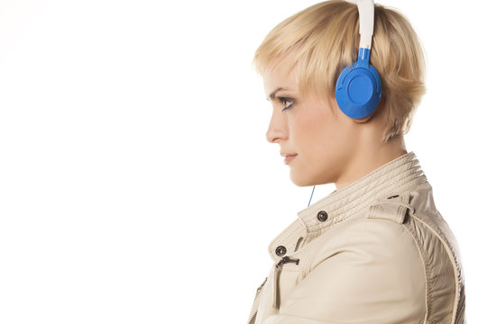 Side view of pretty blonde with short hair and a headset
