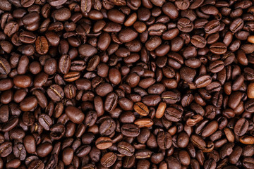 Fototapeta premium Ziarna kawy jako tło z bliska