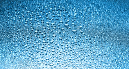 Water drops on blue background, liquid