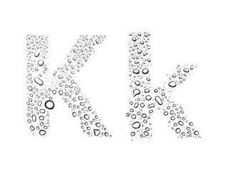 Water drops alphabet letter k, isolated white