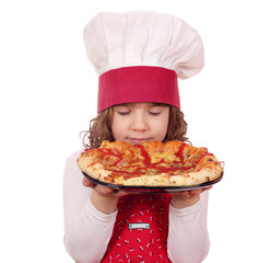 little girl cook smells pizza