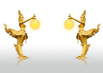 Golden kinnaree statue, Two half-bird half-woman, who is holding