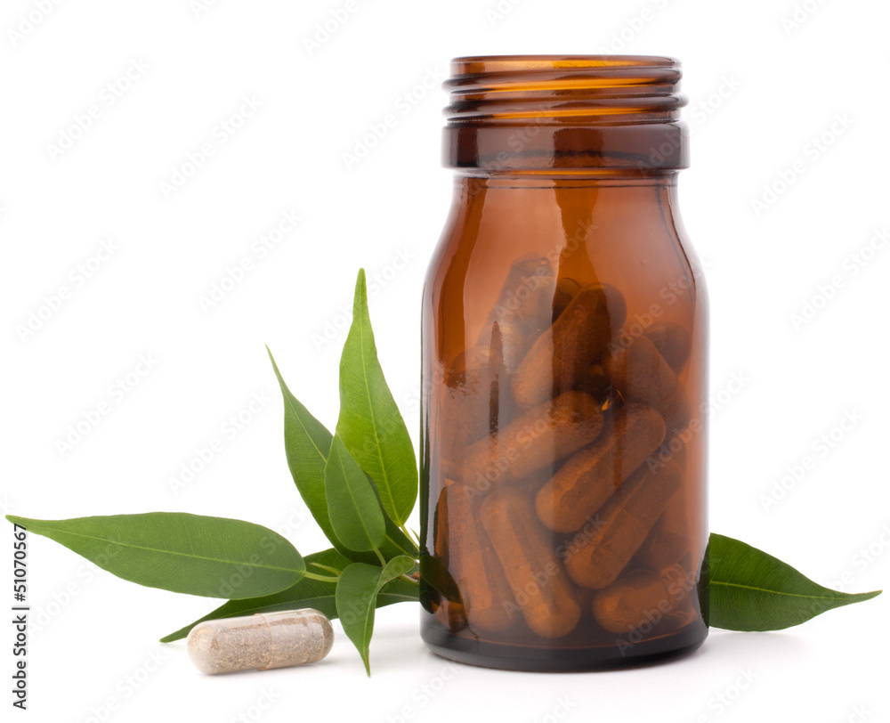 Sticker Herbal drug capsules in brown glass bottle. Alternative medicine