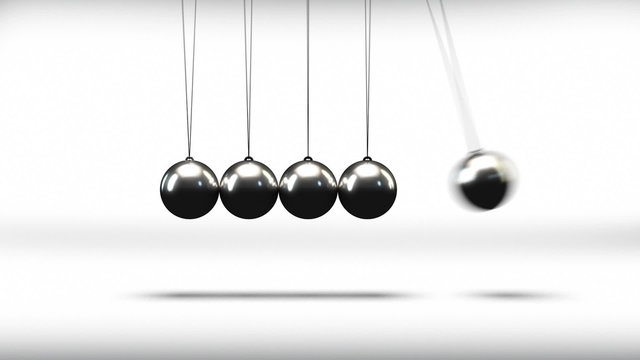 Newton's cradle metal balls striking in seamless loop