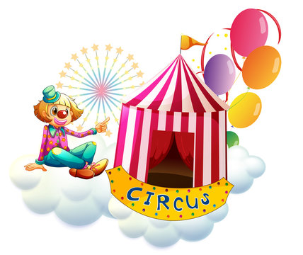 A clown beside a circus tent with balloons