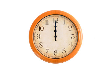 Clock showing 12 o'clock on a white wall