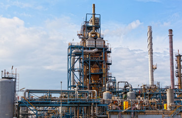 Fototapeta na wymiar View of big oil refinery of a sky background