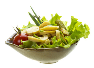Marinated mushrooms in white saucer isolated on white