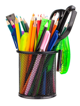 Office cup with scissors, pencils and pens