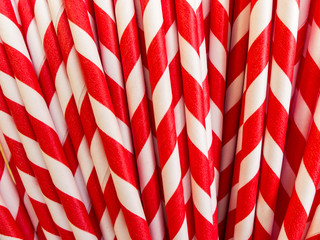 Closeup of red and white paper drinking straws