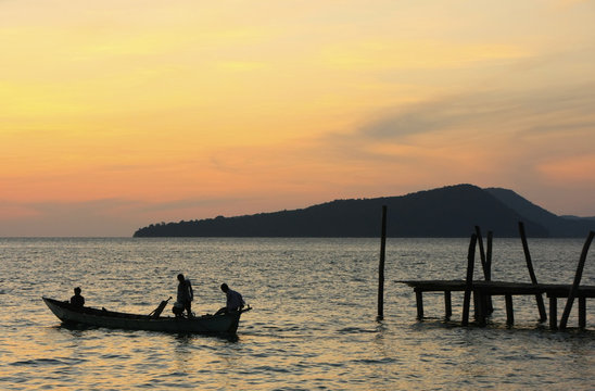 Silhouette of traditional fishing boat at sunrise, Koh Rong isla