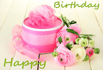 Ranunculus (persian buttercups) and gift,