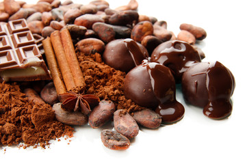 Composition of chocolate sweets, cocoa and spices, isolated