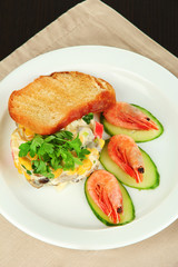 Small portion of food on big plate