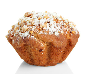 Tasty muffin cake with powdered sugar, isolated on white
