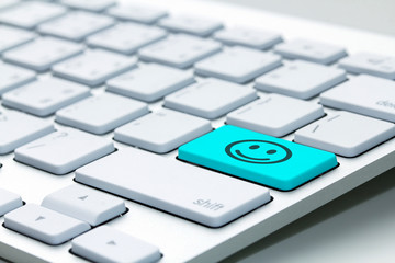 Computer keyboard with smile key