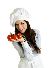 Smiling chef with italian tomatoes