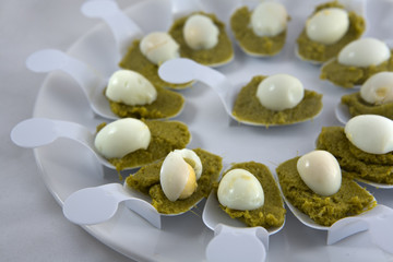 Creamed spinach with quail eggs, detail