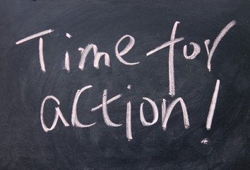 time for action title written with chalk on blackboard