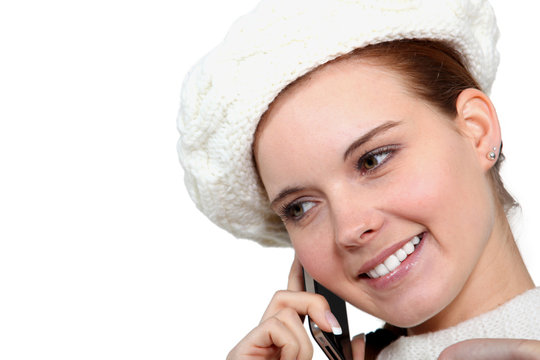 lovely woman making a call and looking happy