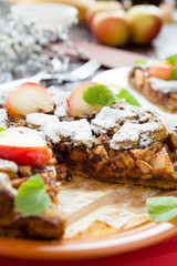cut apple pie on a dish