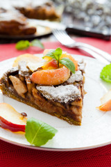 large piece of apple pie on a dish