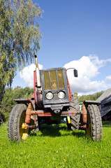 Obraz premium ancient tractor in farm