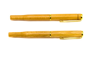two wooden fountain pens isolated on white