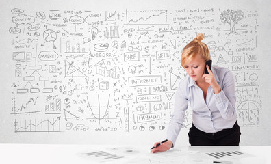 Fototapeta premium Pretty businesswoman planning and calculating various business i