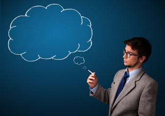 Young man smoking cigarette with idea cloud