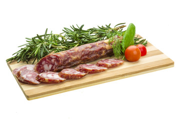 Salami with rosemary, basil and tomato
