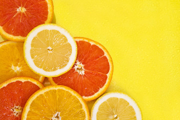 Citrus in a cut on a yellow background