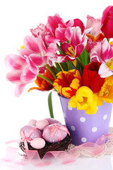Easter composition with fresh tulips and easter eggs isolated