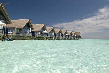Wood villa in a maldivian lagoon
