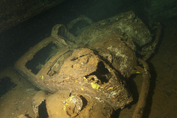 Old Car inside II world war ship wreck hold © Andrea Izzotti