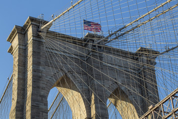 brooklyn bridge with flag