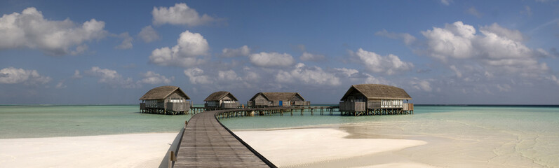 Wood villa in a maldivian lagoon