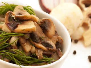 fresh fried mushrooms with dill and onion. macro