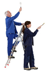 Father and daughter refurbishing home