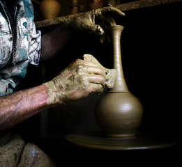 A potter's hands at work