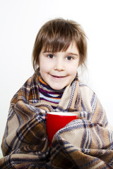 Little girl wit a cup of tea