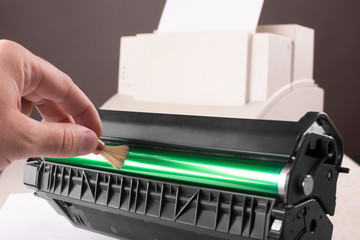 Cleaning printer toner cartridge