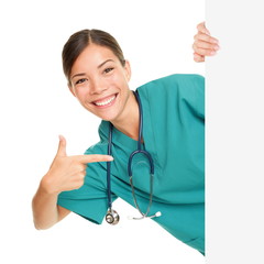 Medical sign person - woman showing blank poster