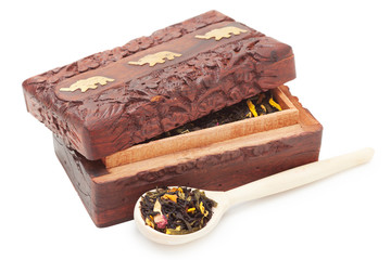 tea box with wooden spoon