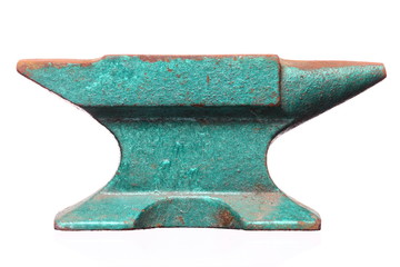 Old rusty green anvil  isolated