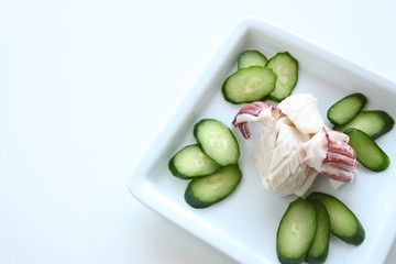chinese cuisine, boiled squid served with cucumber for appetizer