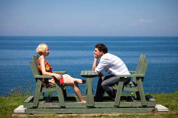 Romantic couple sitting on the bench