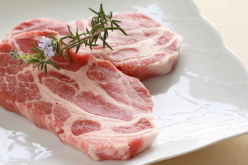 freshness rosemary on pork steak