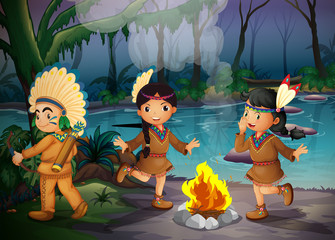 Three Indian kids inside the forest